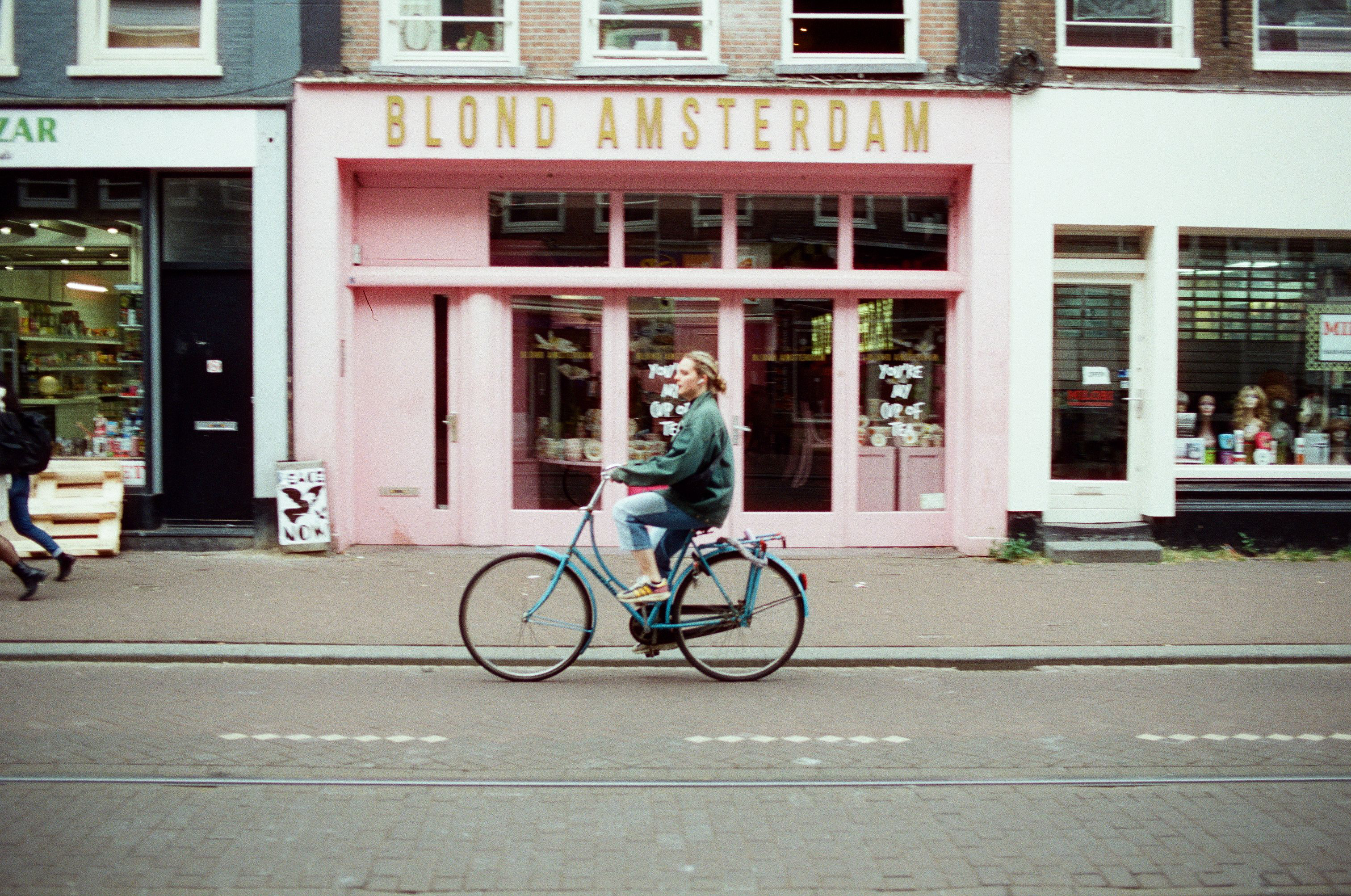 Blonde on bicycle, Amsterdam